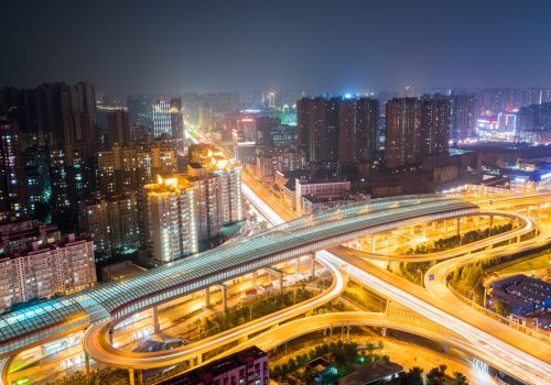 city interchange at night, wuhan cityscape with urban traffic background, China